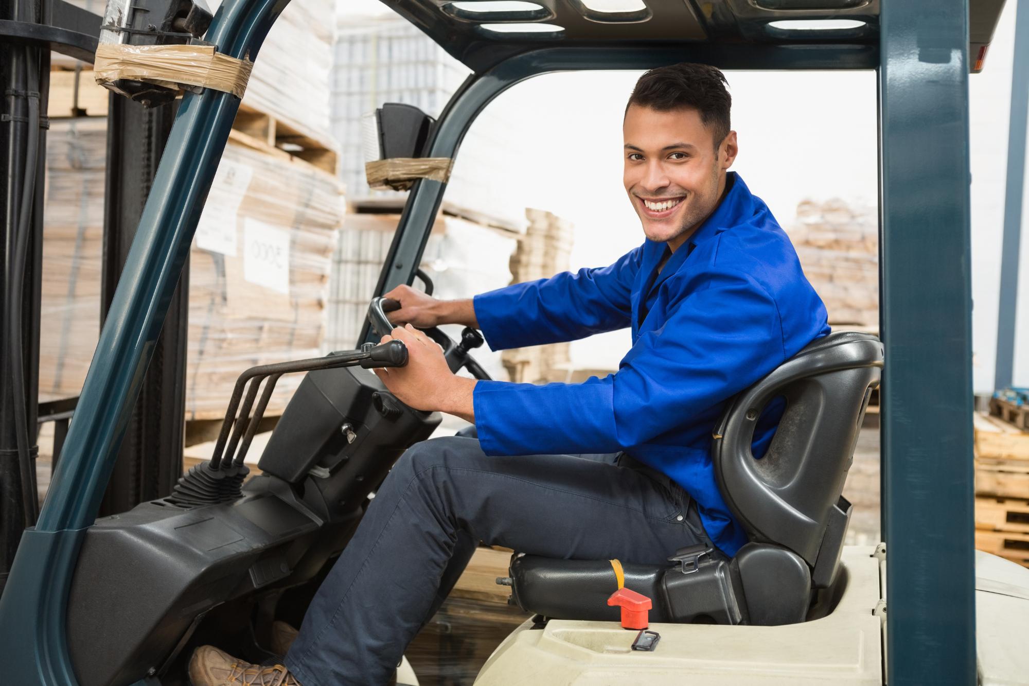 happy man in forklift